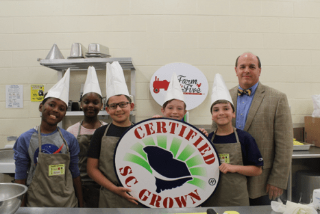 Harbison West Elementary School 4th graders Jayden Samuels, Zakhia Ravenel, Ben Rivera, Henry Dawson, Chris Hionis and Todd A. Bedenbaugh